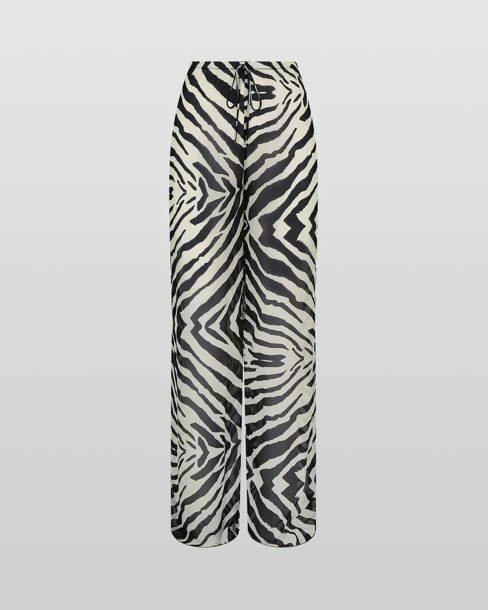 Pantalón Aumare Tenacatita pierna ancha estampado cebra flatlay