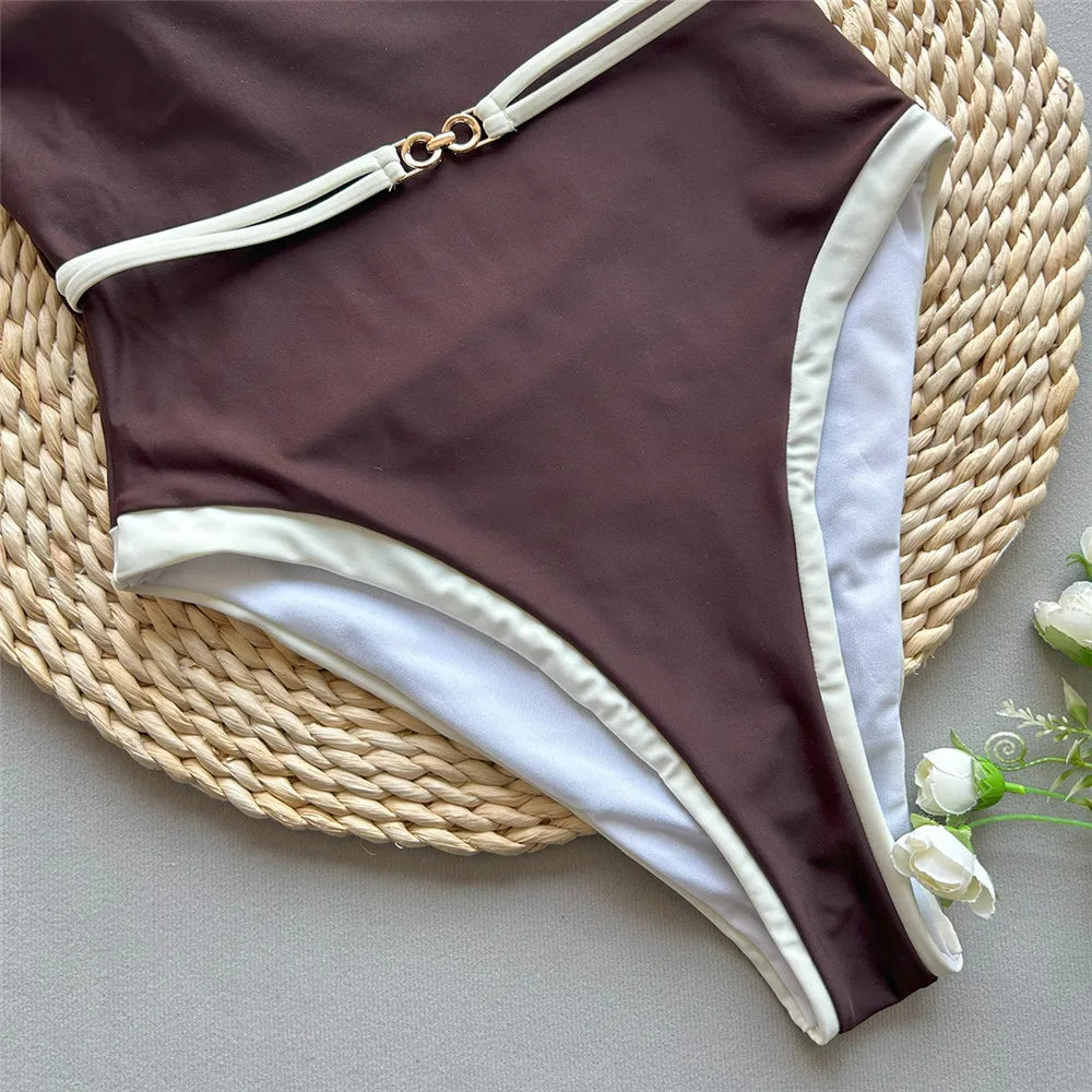 Traje de baño entero Aumare Gigi — composición de marrón y crema