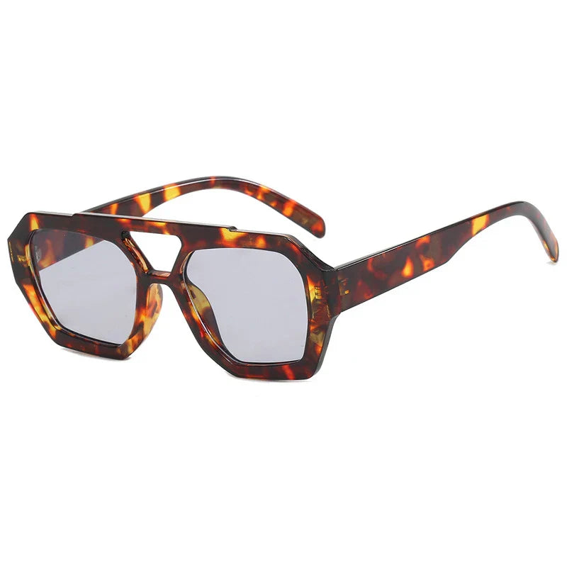 Gafas de sol Aumare Es Vedrà estampado leopardo con lente azul
