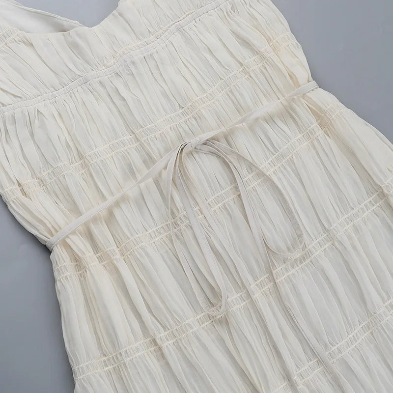 Vestido largo blanco Aumare resort wear de lujo