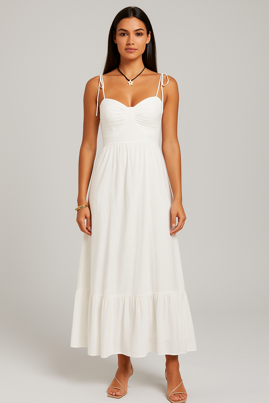 Vestido Aumare Èze blanco largo en la playa al atardecer