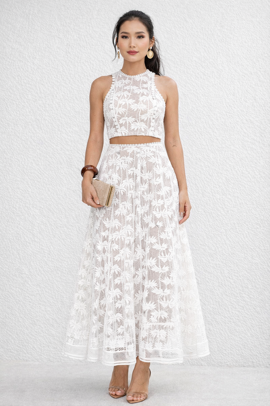 Conjunto Aumare Chamela en encaje blanco — top y falda larga