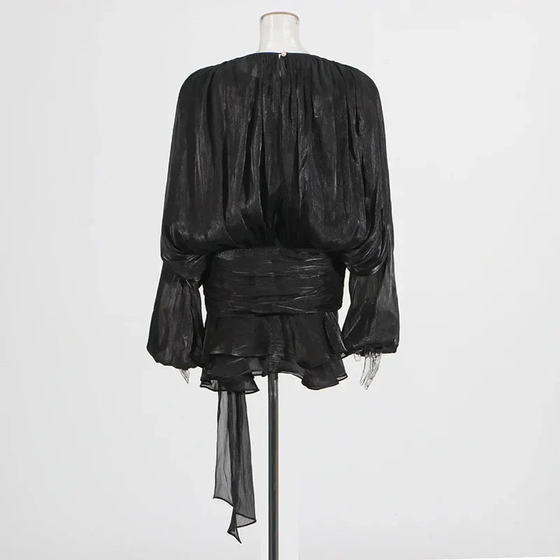 Vestido Aumare Lipari negro detalle de volantes