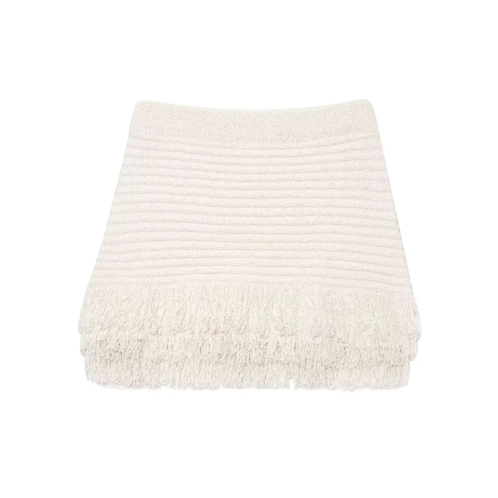 Conjunto Aumare Sisal — detalle de flecos en la falda