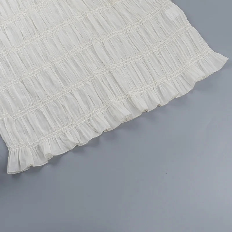 Vestido de resort blanco Aumare detalle escote