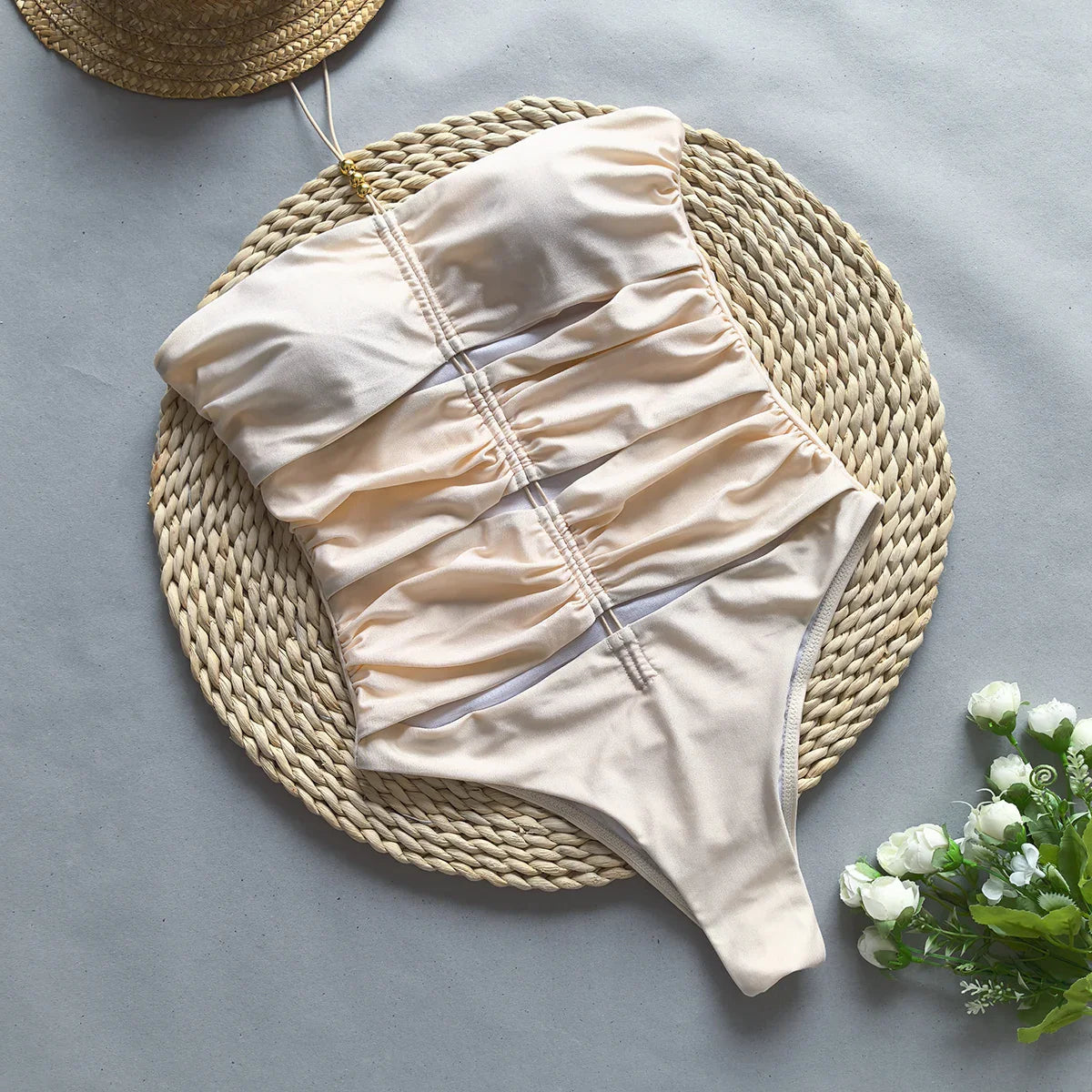 Maillot strapless Aumare Sienna champán con cut-out en cintura